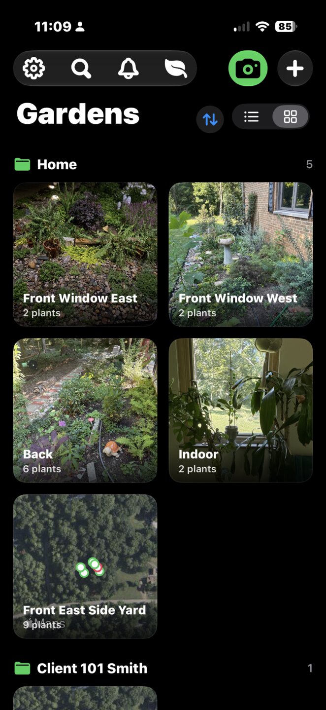 GardenPin's Gardens screen: a grid of photo tiles for each garden, including a map snapshot tile with plant pins